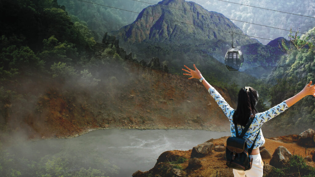 A girl enjoying Dominica's cable car view from the boiling lake